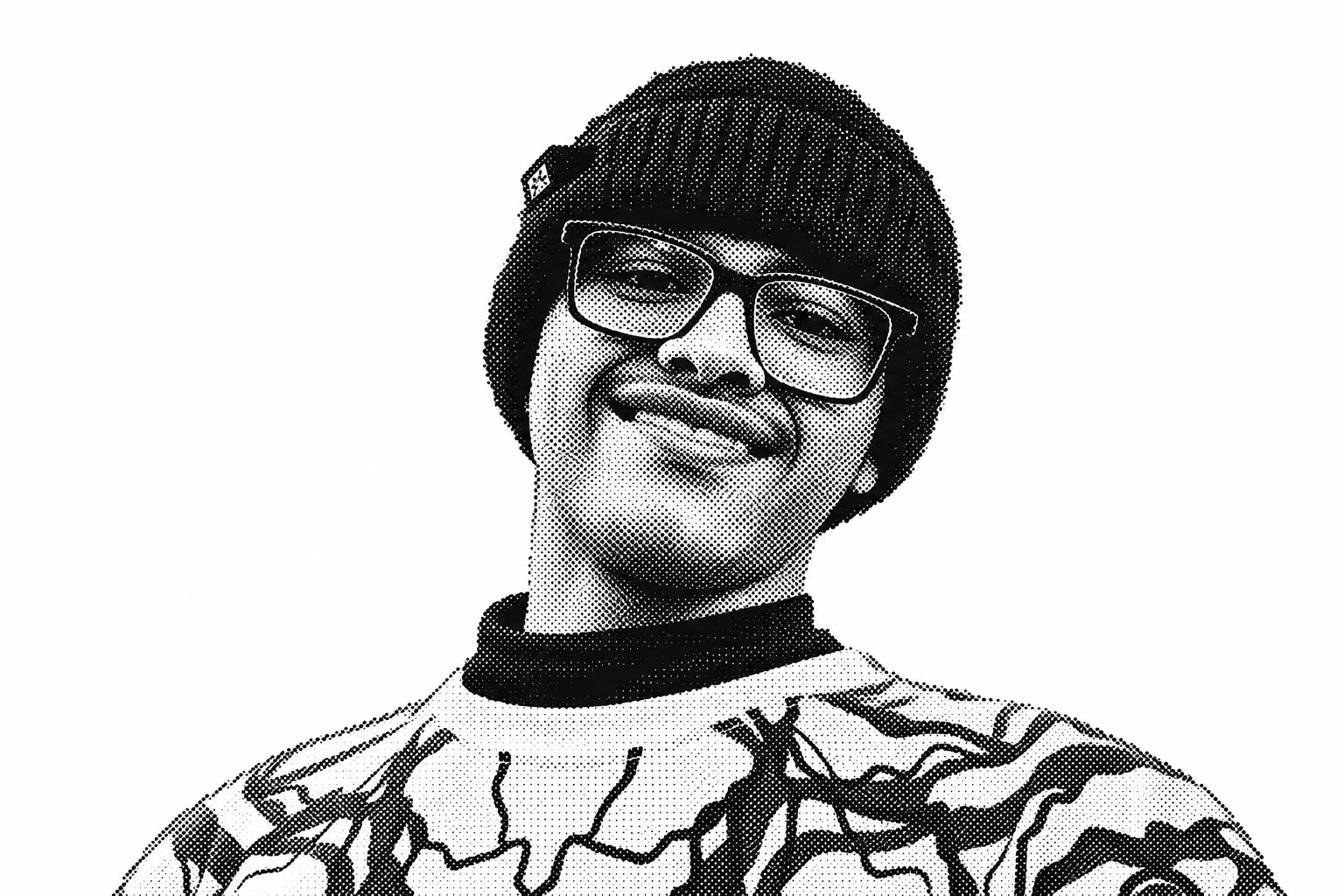 Portrait of Dhyey in a beanie and glasses, smiling.